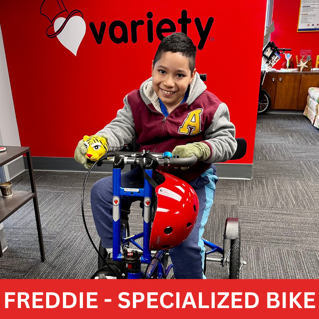 Freddie on blue specialized bike